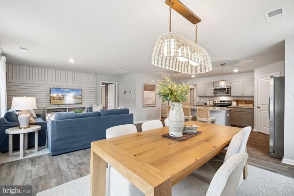 Dining room, Interior, Kitchen, Living room, Pendant Lights, Recessed Lighting, Stainless Steel Appliances, Wood Texture Flooring