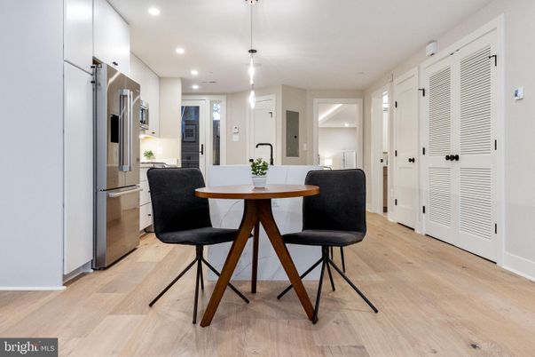 Dining room, Interior, Kitchen, Pendant Lights, Recessed Lighting, Stainless Steel Appliances, Wood Texture Flooring