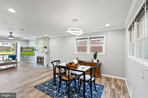 Dining room, Fireplace, Interior, Pendant Lights, Recessed Lighting, Wood Texture Flooring
