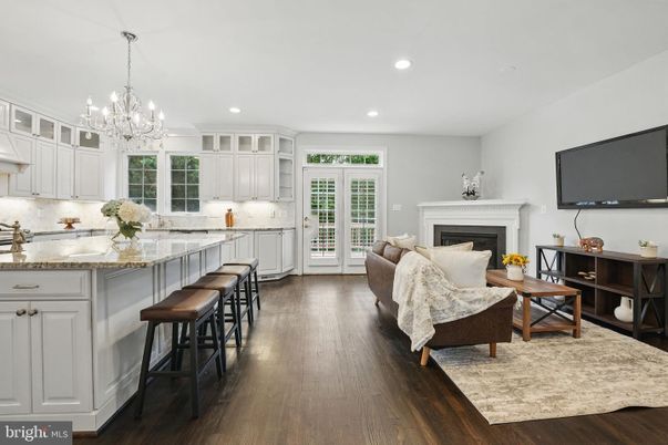 Chandelier, Fireplace, Interior, Kitchen, Living room, Recessed Lighting, Wood Texture Flooring