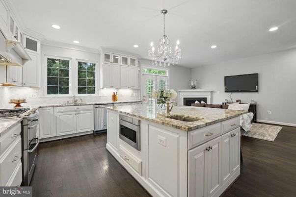 Chandelier, Fireplace, Interior, Kitchen, Recessed Lighting, Wood Texture Flooring