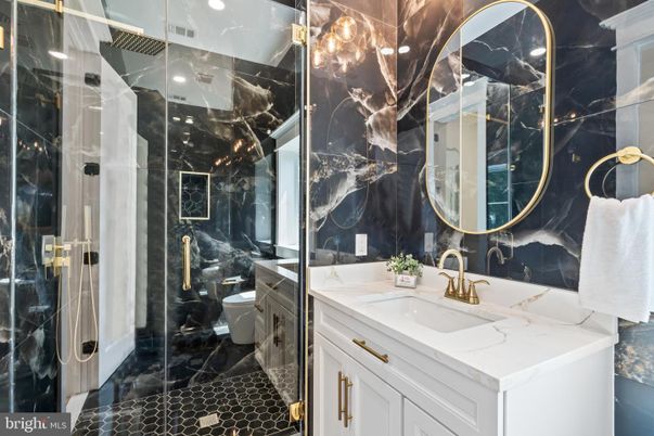 Bathroom, Dual Sink Vanities, Glass Shower, Interior, Marble Walls