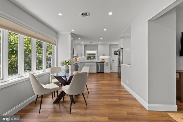 Dining room, Interior, Kitchen, Recessed Lighting, Stainless Steel Appliances, Wood Texture Flooring