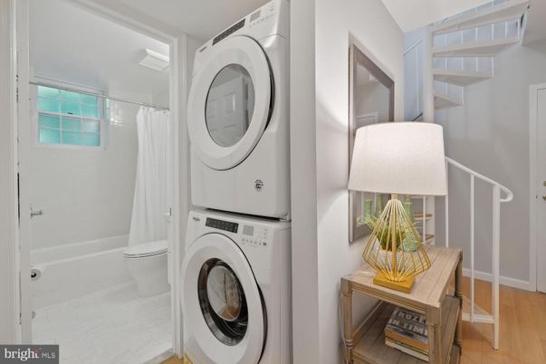Bathroom, Interior, Utility Closets, Washer, Wood Texture Flooring