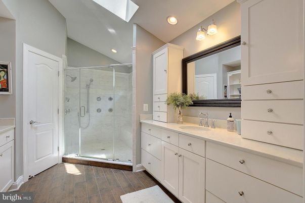 Bathroom, Glass Shower, Interior, Recessed Lighting, Wood Texture Flooring