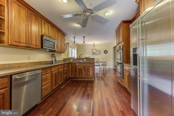 Dining room, Interior, Kitchen, Recessed Lighting, Stainless Steel Appliances, Wood Texture Flooring