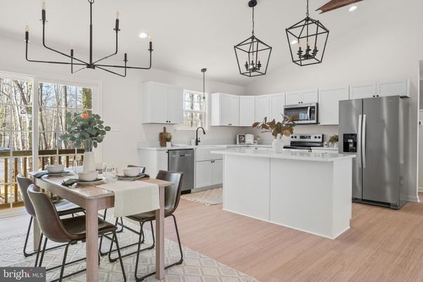 Dining room, Interior, Kitchen, Pendant Lights, Recessed Lighting, Stainless Steel Appliances, Wood Texture Flooring
