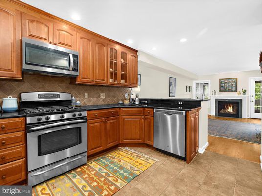 Fireplace, Interior, Kitchen, Recessed Lighting, Stainless Steel Appliances, Wood Texture Flooring