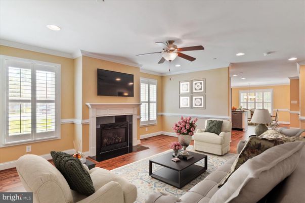 Dining room, Fireplace, Interior, Living room, Pendant Lights, Recessed Lighting, Wood Texture Flooring