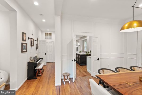 Dining room, Interior, Pendant Lights, Piano, Recessed Lighting, Wood Texture Flooring