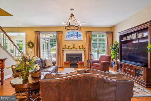Chandelier, Fireplace, Interior, Living room, Recessed Lighting, Wood Texture Flooring