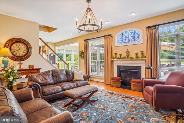 Chandelier, Fireplace, Interior, Living room, Recessed Lighting, Wood Texture Flooring