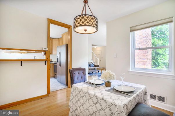 Dining room, Interior, Kitchen, Pendant Lights, Stainless Steel Appliances, Wood Texture Flooring