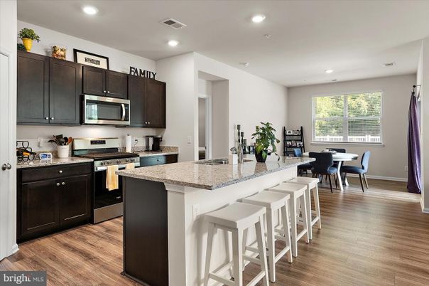 Dining room, Interior, Kitchen, Recessed Lighting, Stainless Steel Appliances, Wood Texture Flooring