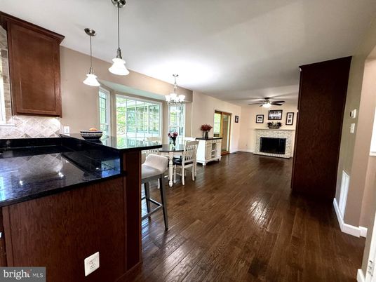 Chandelier, Dining room, Fireplace, Interior, Pendant Lights, Wood Texture Flooring