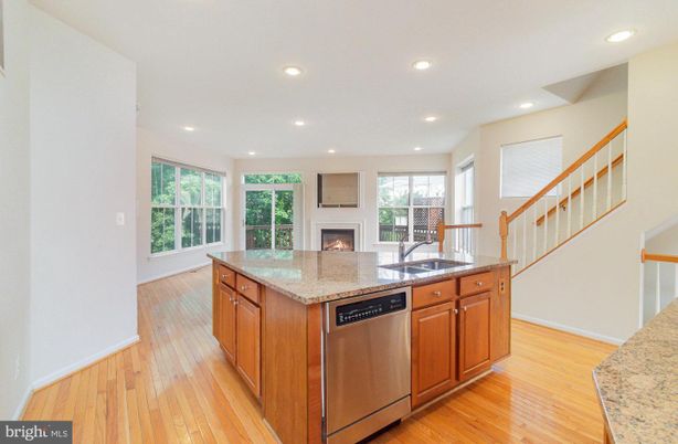 Fireplace, Interior, Kitchen, Recessed Lighting, Wood Texture Flooring