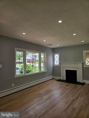 Empty room, Fireplace, Interior, Recessed Lighting, Wood Texture Flooring