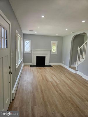 Empty room, Fireplace, Interior, Recessed Lighting, Wood Texture Flooring