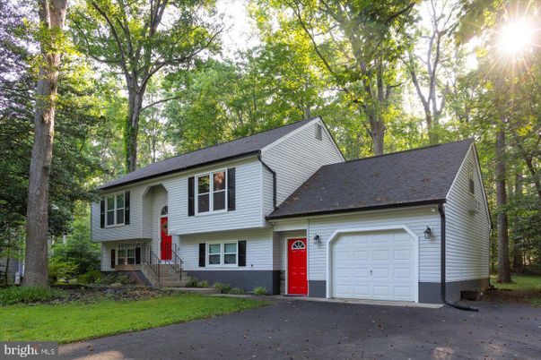 Attached, Exterior, Facade, Raised Ranch