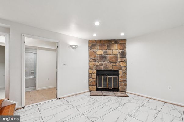 Bathroom, Fireplace, Interior, Marble, Recessed Lighting, Stone Walls