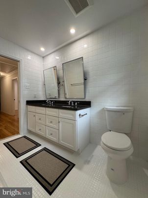 Bathroom, Dual Sink Vanities, Interior, Recessed Lighting, Wood Texture Flooring