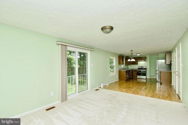 Empty room, Interior, Kitchen, Stainless Steel Appliances, Wood Texture Flooring