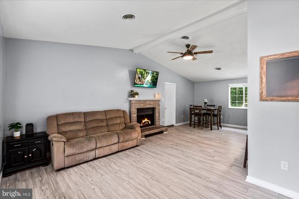 Dining room, Fireplace, Interior, Living room, Wood Texture Flooring
