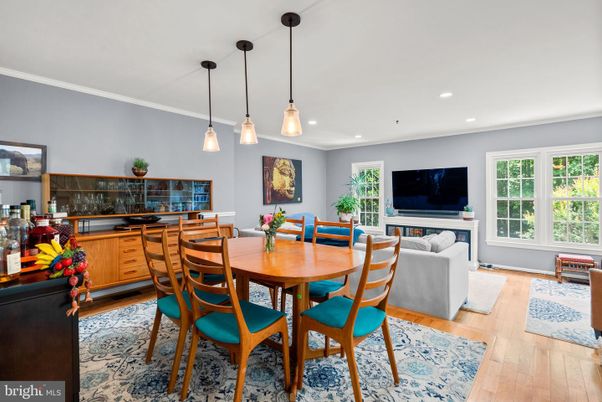 Dining room, Fireplace, Interior, Living room, Pendant Lights, Recessed Lighting, Wood Texture Flooring