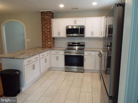Interior, Kitchen, Recessed Lighting, Stainless Steel Appliances, Stone Walls