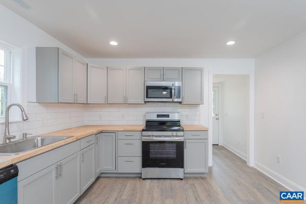Interior, Kitchen, Recessed Lighting, Stainless Steel Appliances, Wood Texture Flooring