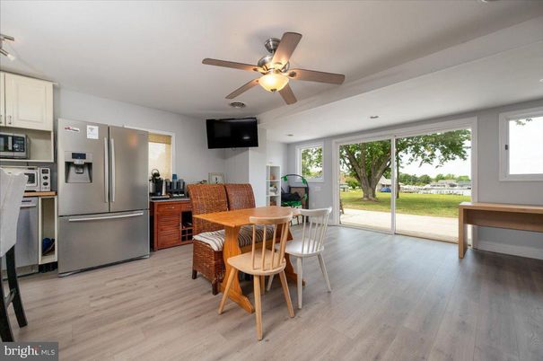 Dining room, Interior, Kitchen, Recessed Lighting, Stainless Steel Appliances, Wood Texture Flooring