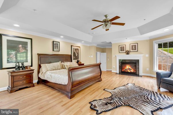 Bedroom, Fireplace, Interior, Recessed Lighting, Wood Texture Flooring
