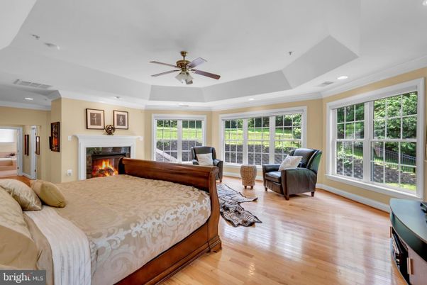 Bedroom, Fireplace, Interior, Recessed Lighting, Wood Texture Flooring