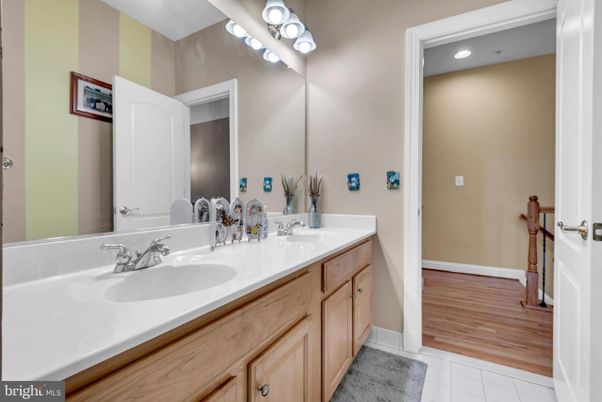 Bathroom, Dual Sink Vanities, Interior, Recessed Lighting, Wood Texture Flooring