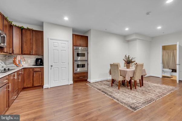 Dining room, Interior, Kitchen, Recessed Lighting, Stainless Steel Appliances, Wood Texture Flooring