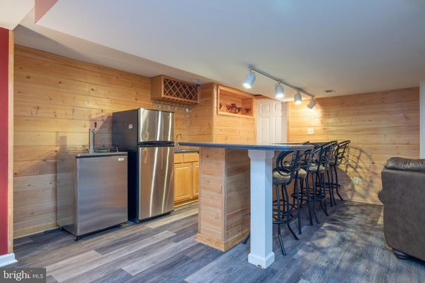 Interior, Stainless Steel Appliances, Wood Texture Flooring, Wooden Walls