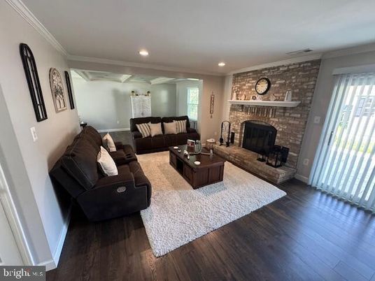 Fireplace, Interior, Living room, Recessed Lighting, Stone Walls, Wood Texture Flooring