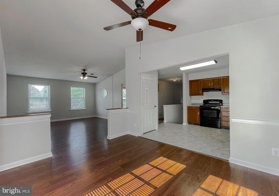 Empty room, Interior, Kitchen, Stainless Steel Appliances, Wood Texture Flooring