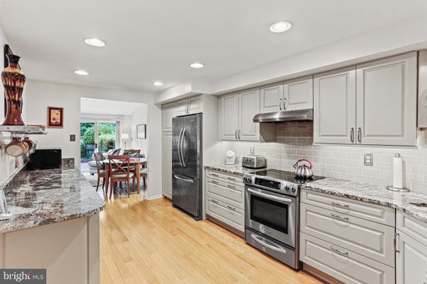 Dining room, Interior, Kitchen, Recessed Lighting, Stainless Steel Appliances, Wood Texture Flooring
