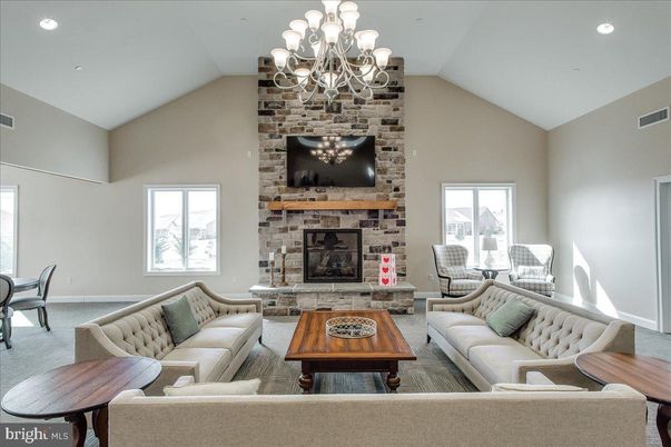 Chandelier, Dining room, Fireplace, Interior, Living room, Recessed Lighting, Stone Walls