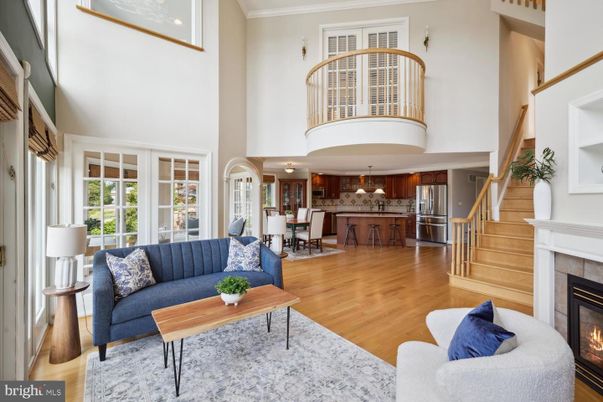 Chandelier, Dining room, Fireplace, Interior, Kitchen, Living room, Stainless Steel Appliances, Wood Texture Flooring