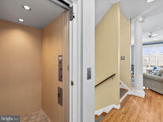 Elevator, Interior, Recessed Lighting, Wood Texture Flooring