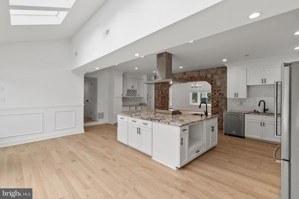 Interior, Kitchen, Recessed Lighting, Stainless Steel Appliances, Stone Walls, Wood Texture Flooring