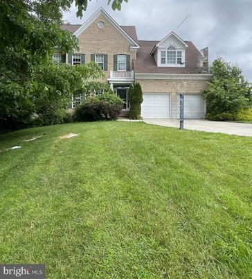Attached, Backyard, Exterior, Facade, Brick Facade, Brick Traditional
