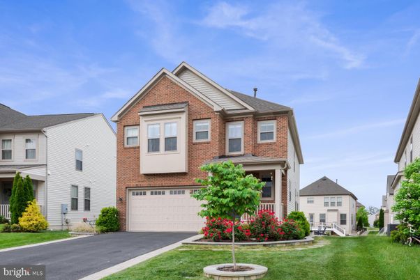 Attached, Exterior, Facade, Brick Facade, Brick Traditional
