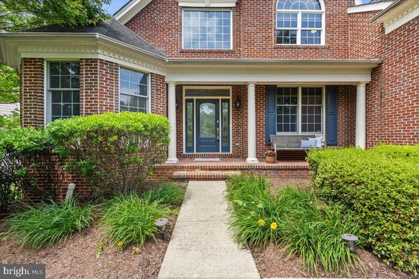 Exterior, Facade, Brick Facade, American Foursquare