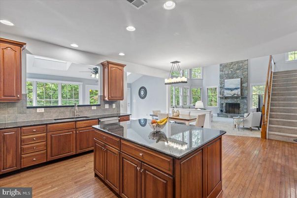 Dining room, Fireplace, Interior, Kitchen, Living room, Pendant Lights, Recessed Lighting, Stone Walls, Wood Texture Flooring