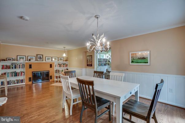 Chandelier, Dining room, Fireplace, Interior, Pendant Lights, Wood Texture Flooring