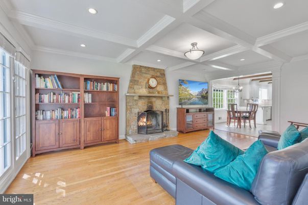 Chandelier, Dining room, Fireplace, Interior, Living room, Recessed Lighting, Stone Walls, Wood Texture Flooring