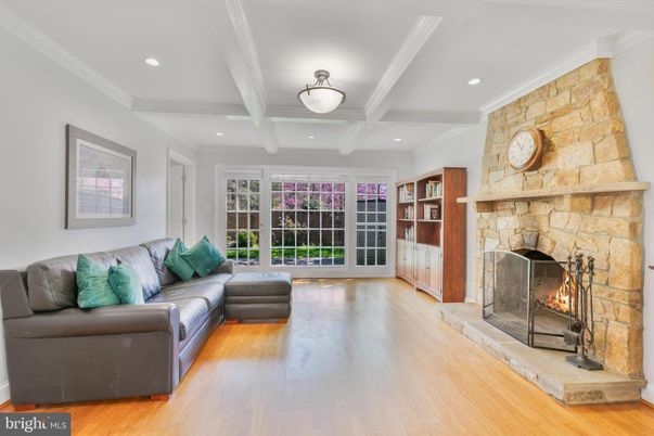 Fireplace, Interior, Living room, Recessed Lighting, Stone Walls, Wood Texture Flooring